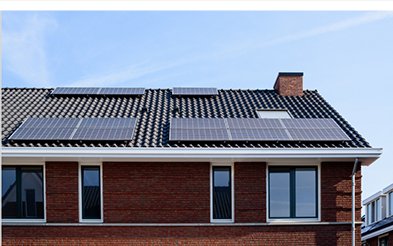 Rooftop solar array on a brick house